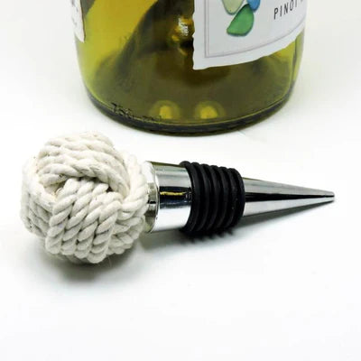 Wine bottle stopper with rope design on a white background